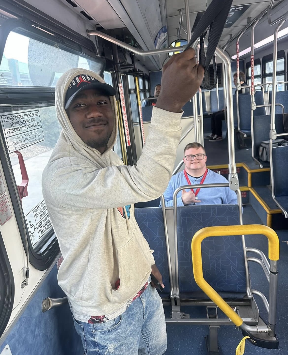 Two students on a bus