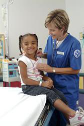 Student handbook cover page with title and photo of a school nurse with a child