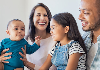 Parents with children smiling