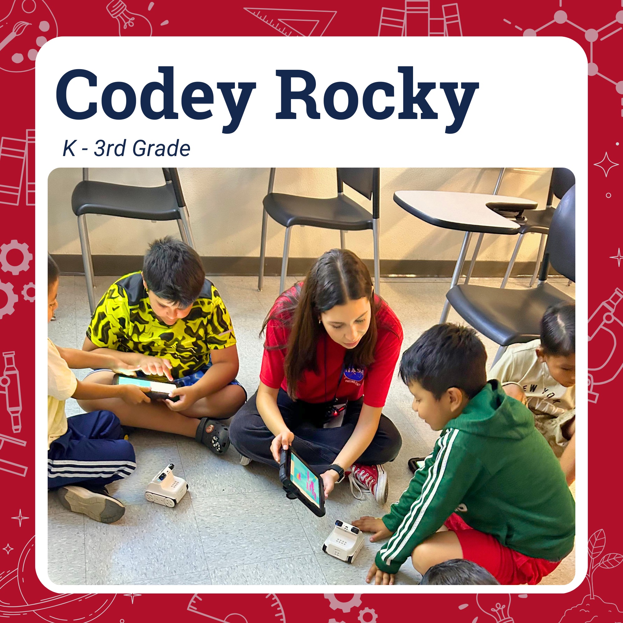 CBL tutor with students in a circle showing how to use Codey Rocky