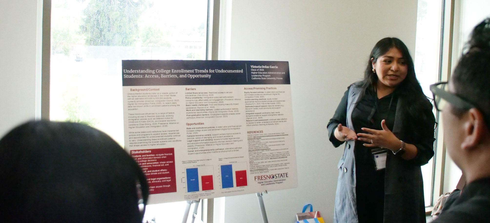 HEAL student presents their poster.