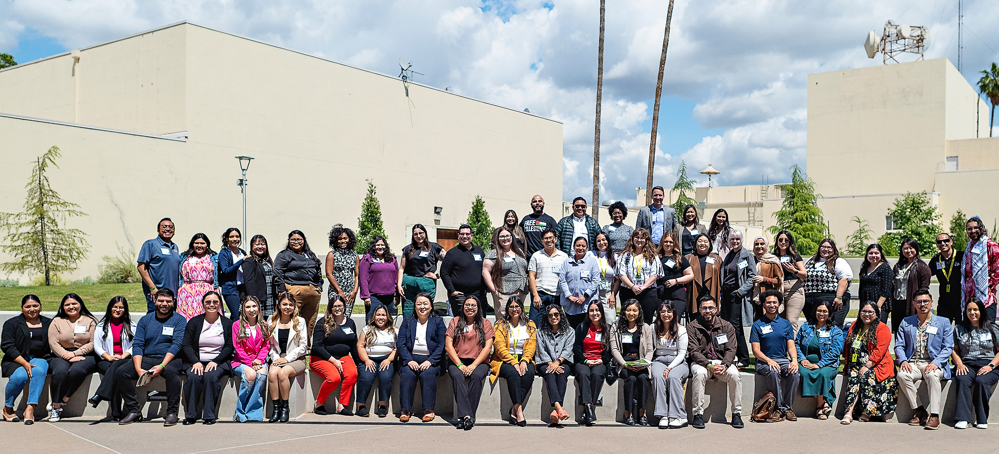 Group photo outside of conference attendees and organizers