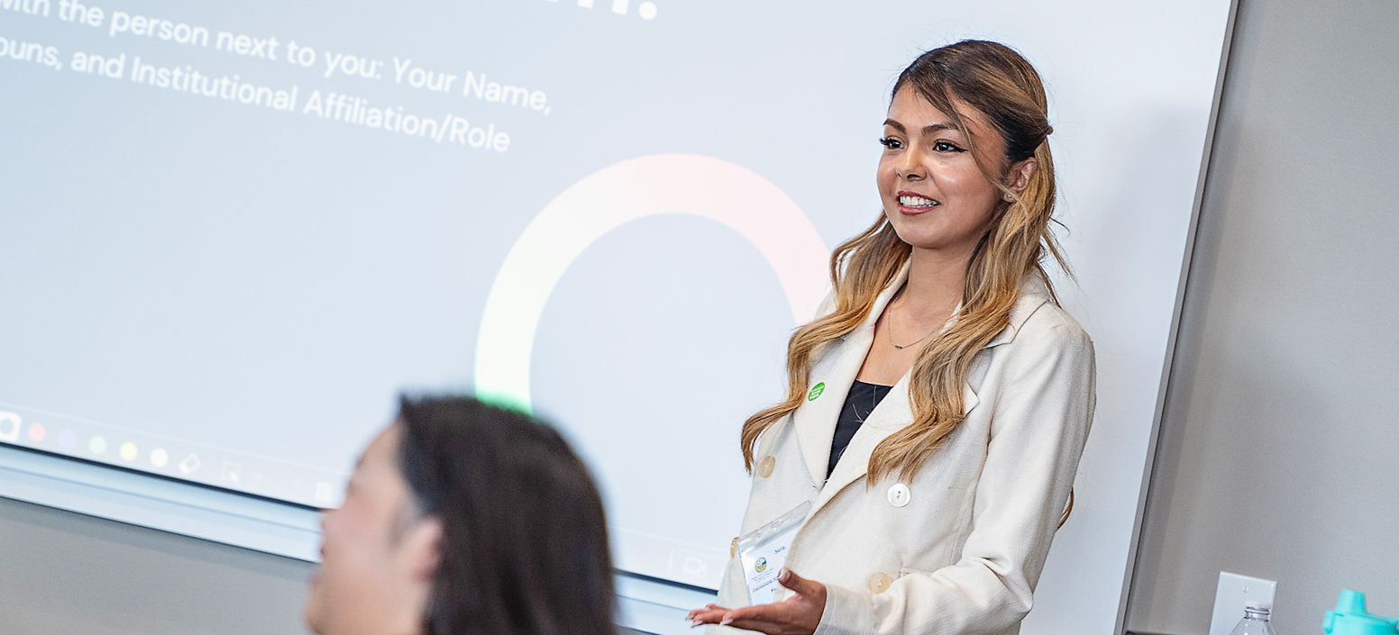 Presenter speaking to students